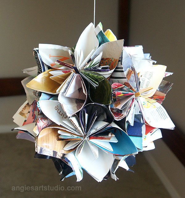 Recycle magazine into flower globe